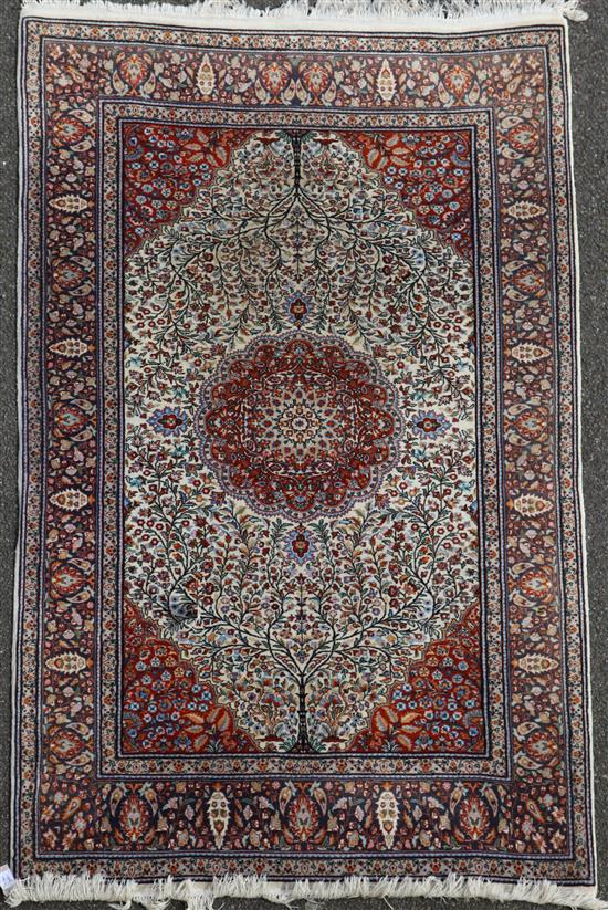 An Persian rug, 7ft 2in by 4ft 6in.